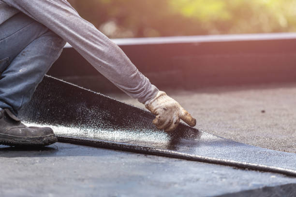 Professional Basement Waterproofing technician working in Deputy, IN